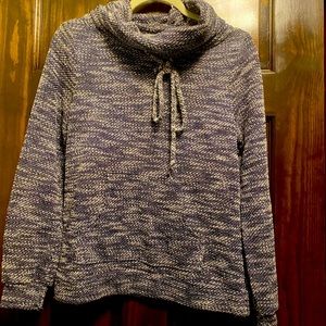 Pull over sweater with pink, grey and white colors.